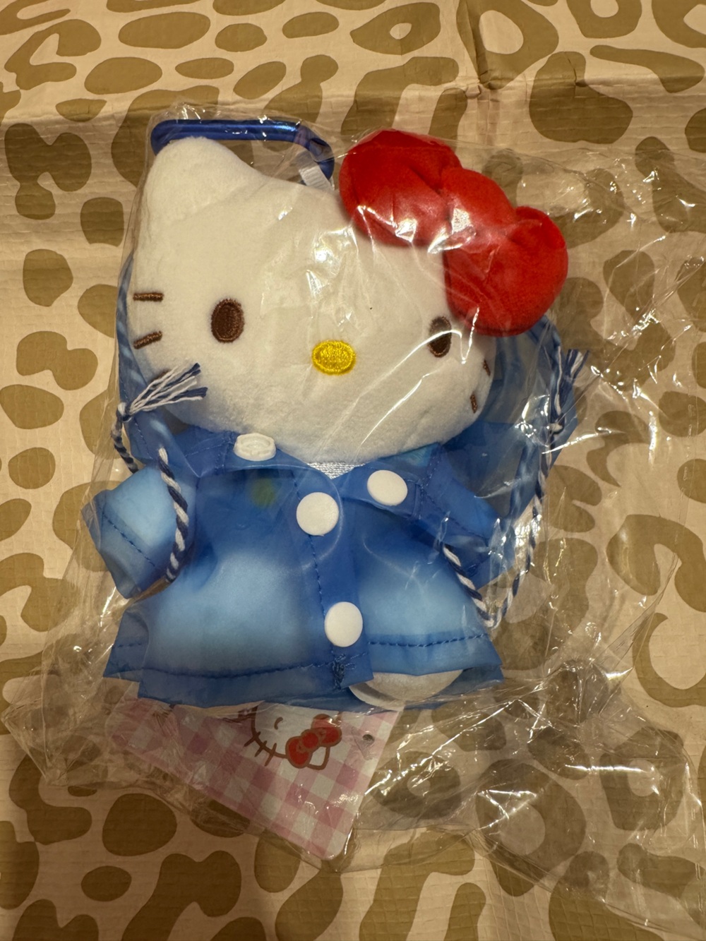 Hello Kitty Plush Bag Charm Keychain in Blue Raincoat with Red Bow